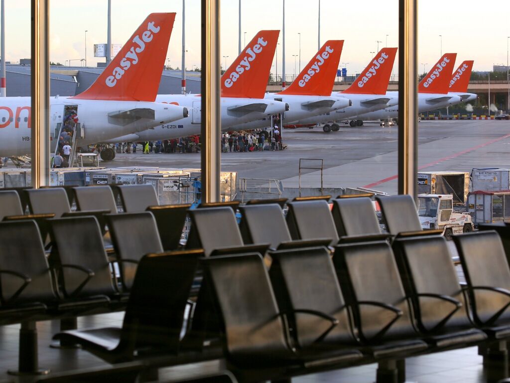 Easy Jet Airbus A320 tails at Schiphol airport